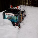 LEGO City Heavy Cargo Transport 60183 truck hits a snowbank