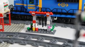 LEGO City Train Emergency Station next to lego trains
