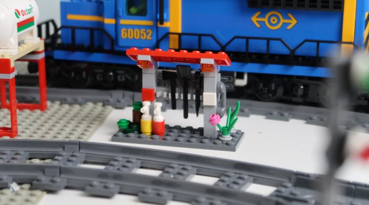LEGO City Train Emergency Station next to lego trains